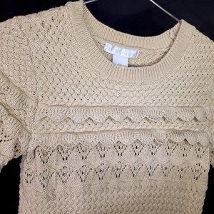 A Cozy Cream Color Knitted Sweater